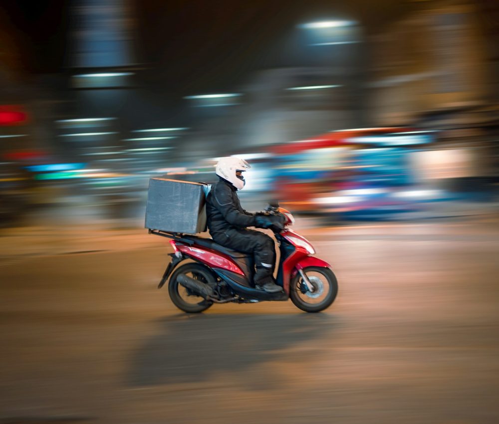 man riding motorcycle on road during daytime